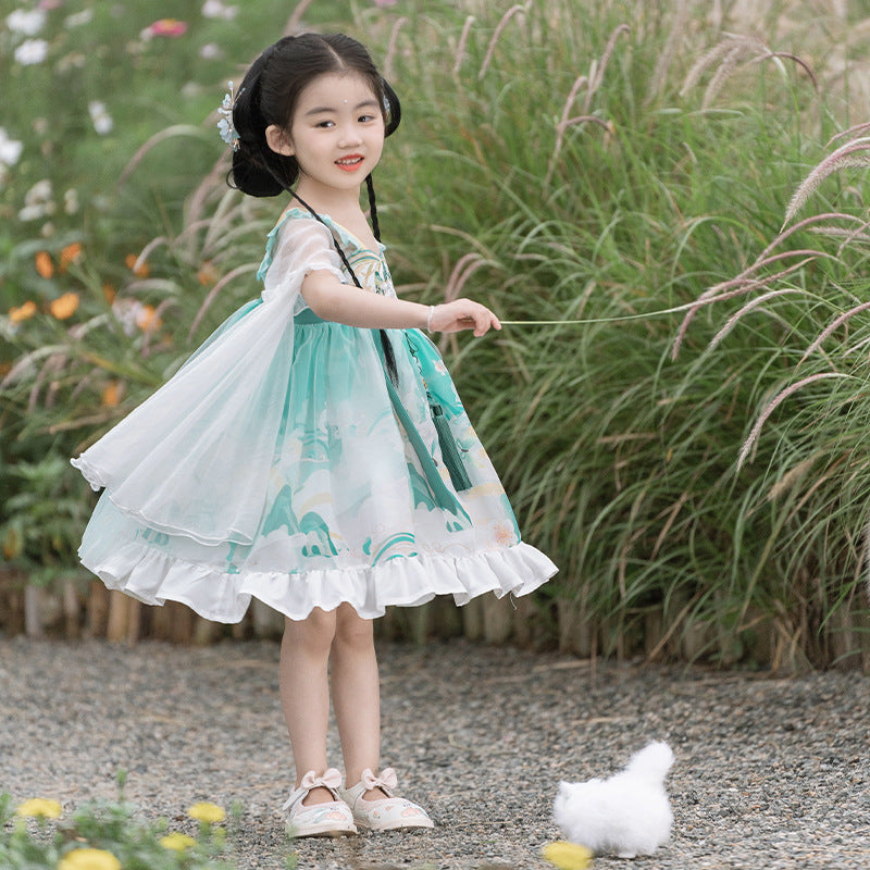 A young girl wearing a green Lolita-style hanfu party dress with intricate embroidery.