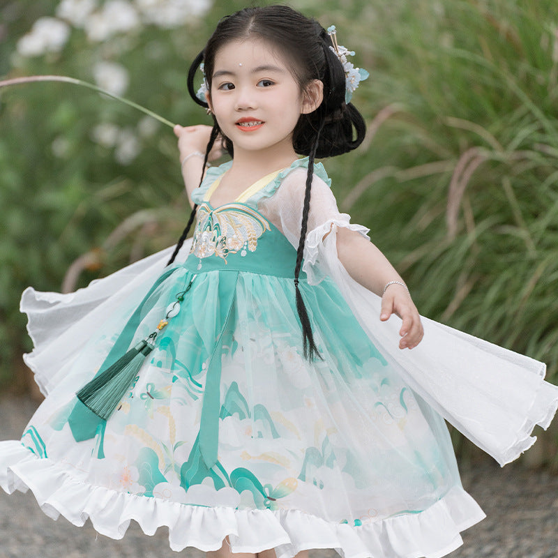 A child in a green floral Lolita-style hanfu outfit suitable for spring outings.