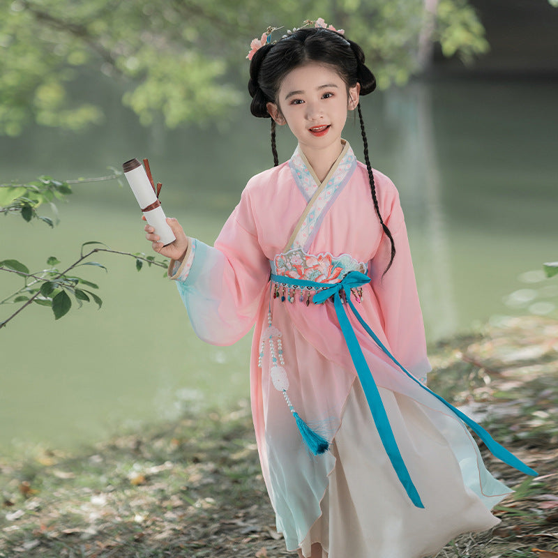 A child wears pink Hanfu to participate in a traditional Chinese celebration. Breathable and comfortable